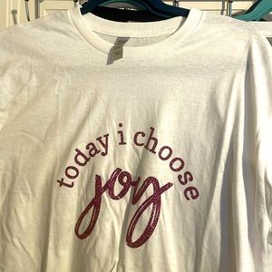 A large, white with pink sparkling letters “Today I choose joy” t shirt.